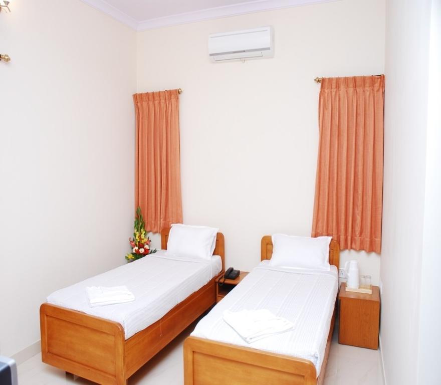 The Tavern Bed and Breakfast Bangalore Værelse billede